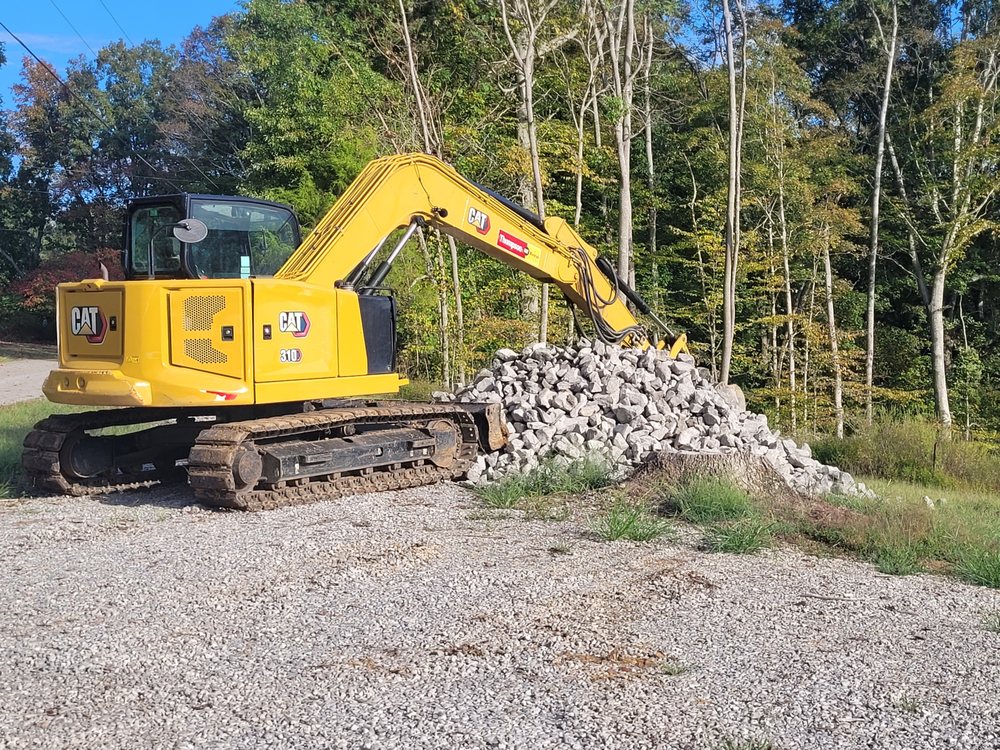 CAT excavator digging on a residential excavation job in Putnam County TN