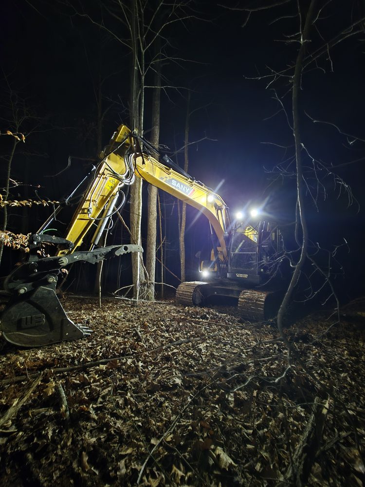 Excavator clearing wooded acreage in the Upper Cumberland Tennessee