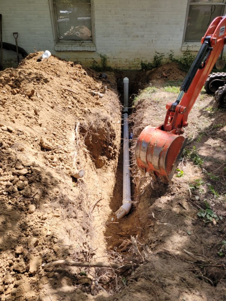Septic system trench installation by First Call Land Works in Cookeville TN